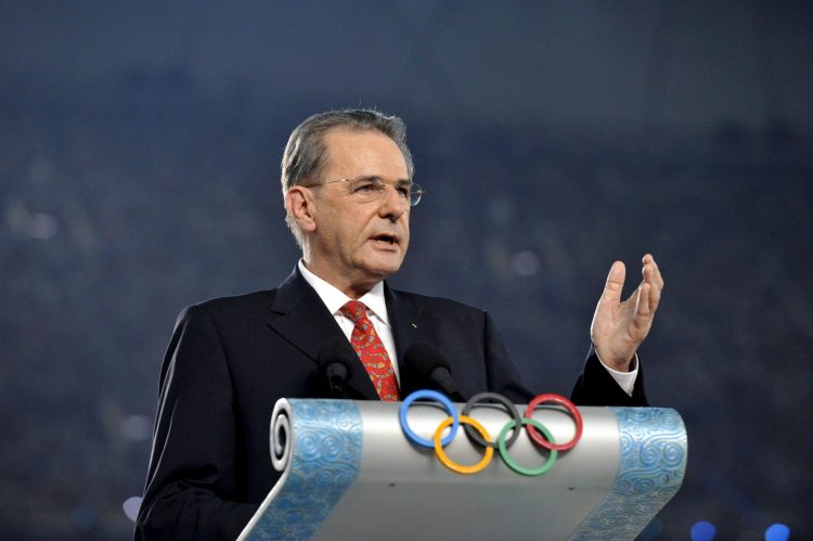 epa01435710 IOC President Jacques Rogge delivers his speech during the Opening Ceremony of the Beijing 2008 Olympic Games, Beijing, China, 08 August 2008.  EPA/John Mabanglo