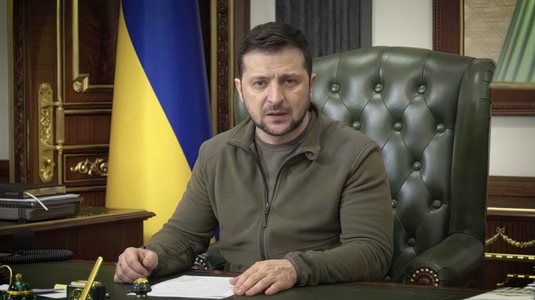 In this image from video provided by the Ukrainian Presidential Press Office and posted on Facebook, Ukrainian President Volodymyr Zelenskyy speaks in Kyiv, Ukraine, on early Wednesday, March 16, 2022. Zelenskyy said early Wednesday that Russia's demands during the negotiations are becoming "more realistic" after nearly three weeks of war. He said more time was needed for the talks, which are being held by video conference. "Efforts are still needed, patience is needed," he said in his nighttime video address to the nation. "Any war ends with an agreement."(Ukrainian Presidential Press Office via AP)